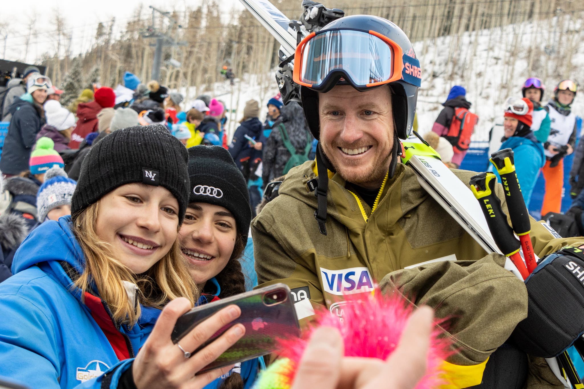 Ted Ligety poses for a picture with some fans at the Birds of Prey race.