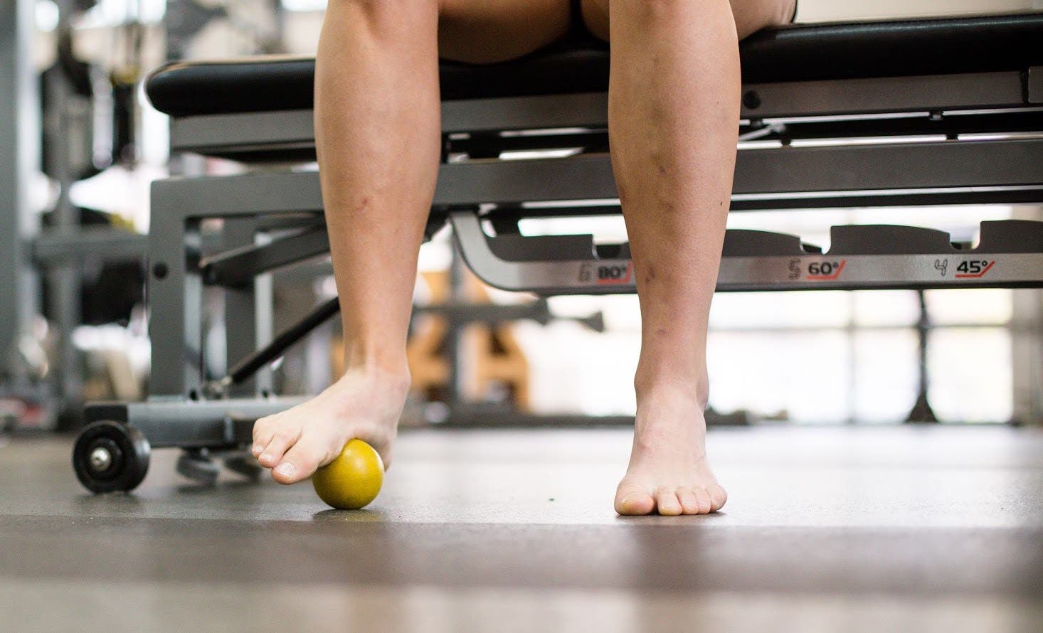 Lacrosse ball as foot massage tool