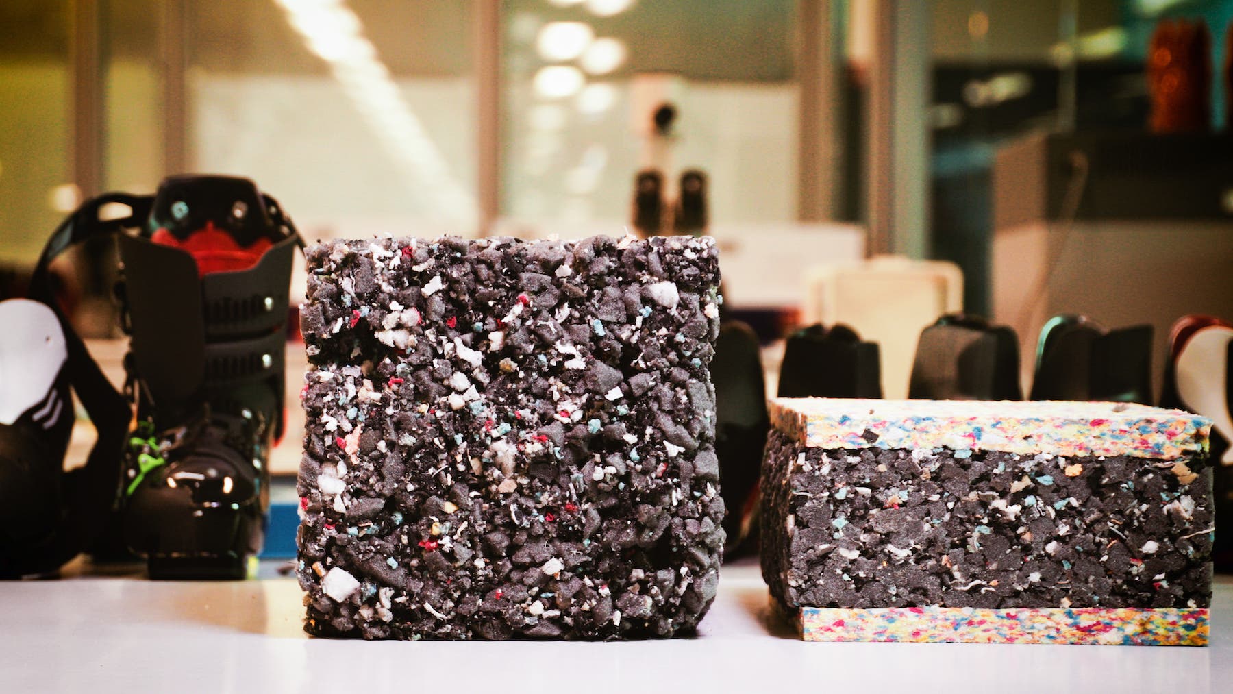 Cubes of recycled ski boot materials