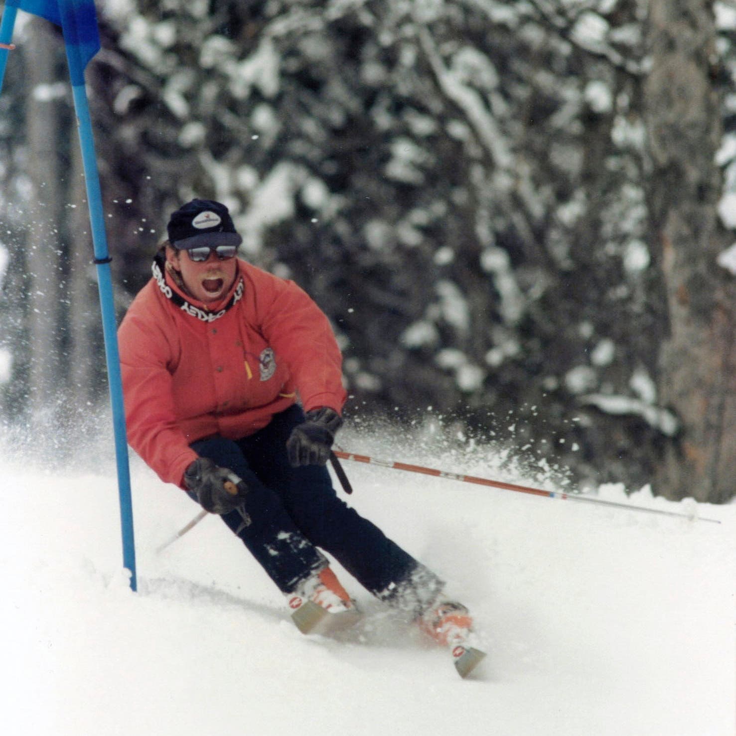 Skiing dad in race course