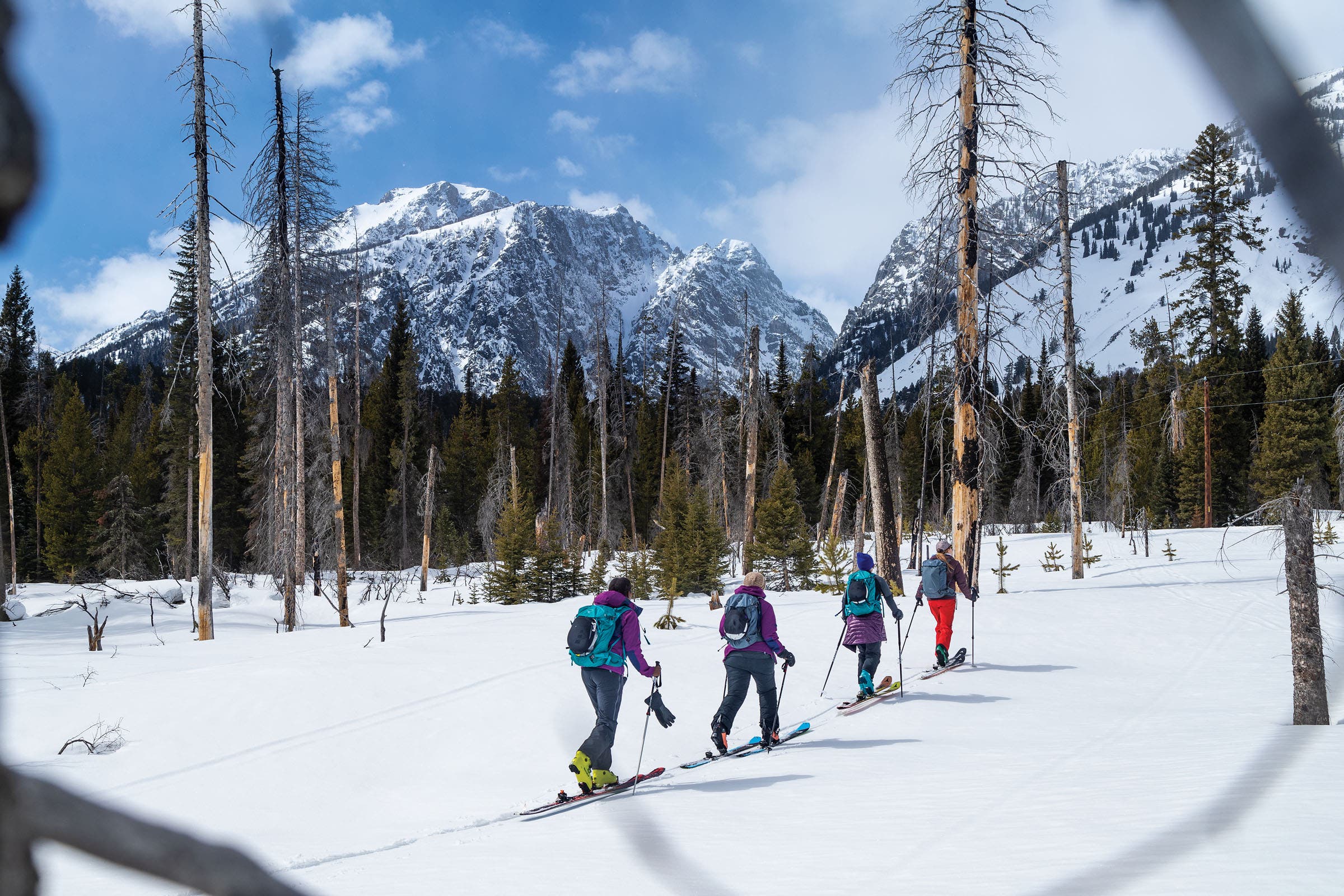 Baker guides Sato and fellow BIPOC camp participants Annette Diggs and Keta Burke-Williams on their first backcountry ski day. Photo: Mary McIntyre