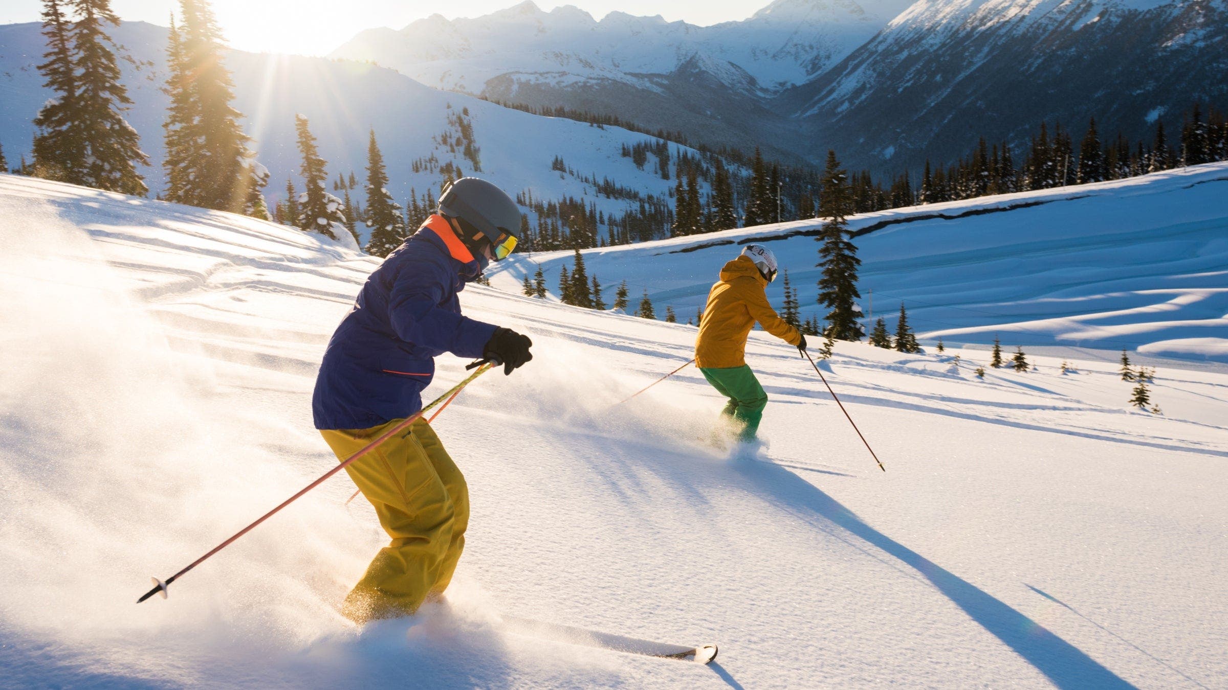 two beginner skiers