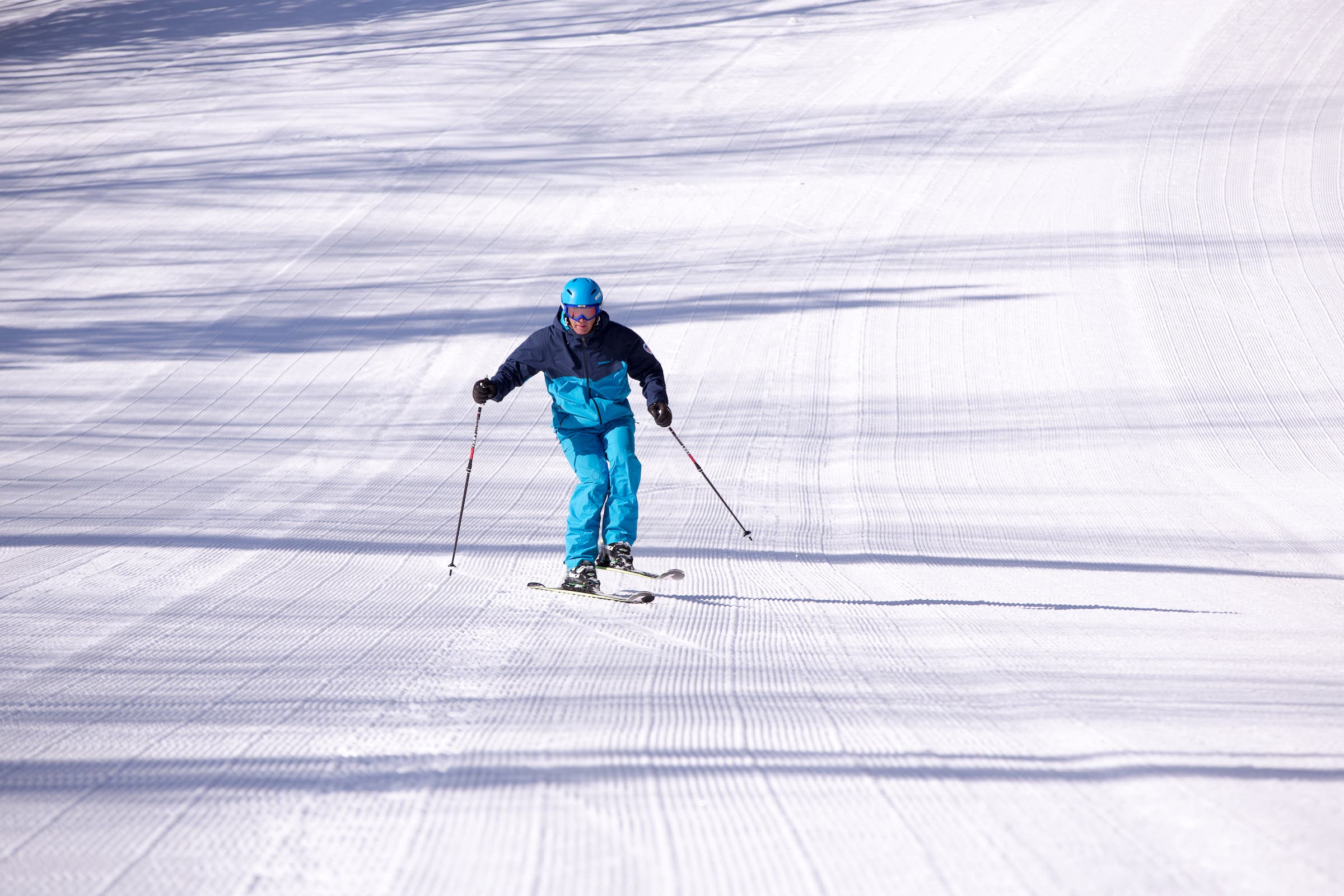 Ski instructor MIchael Rogan demonstrates one-ski drill