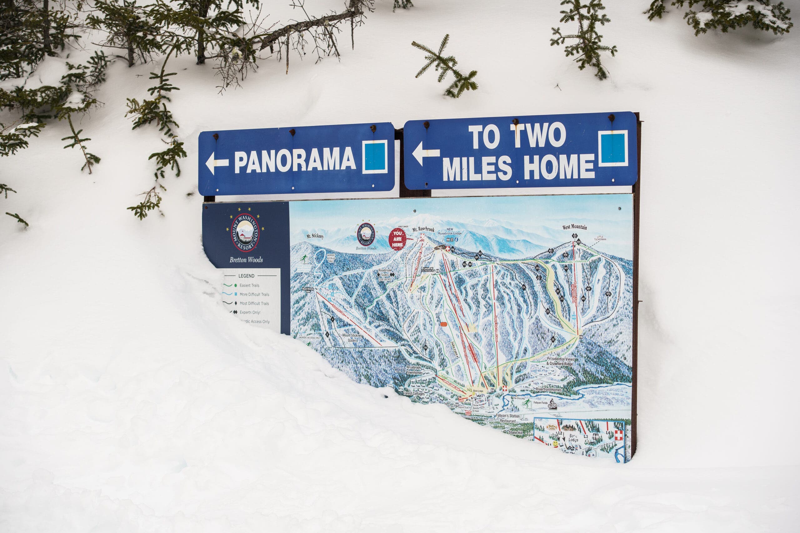 Trail map covered in snow