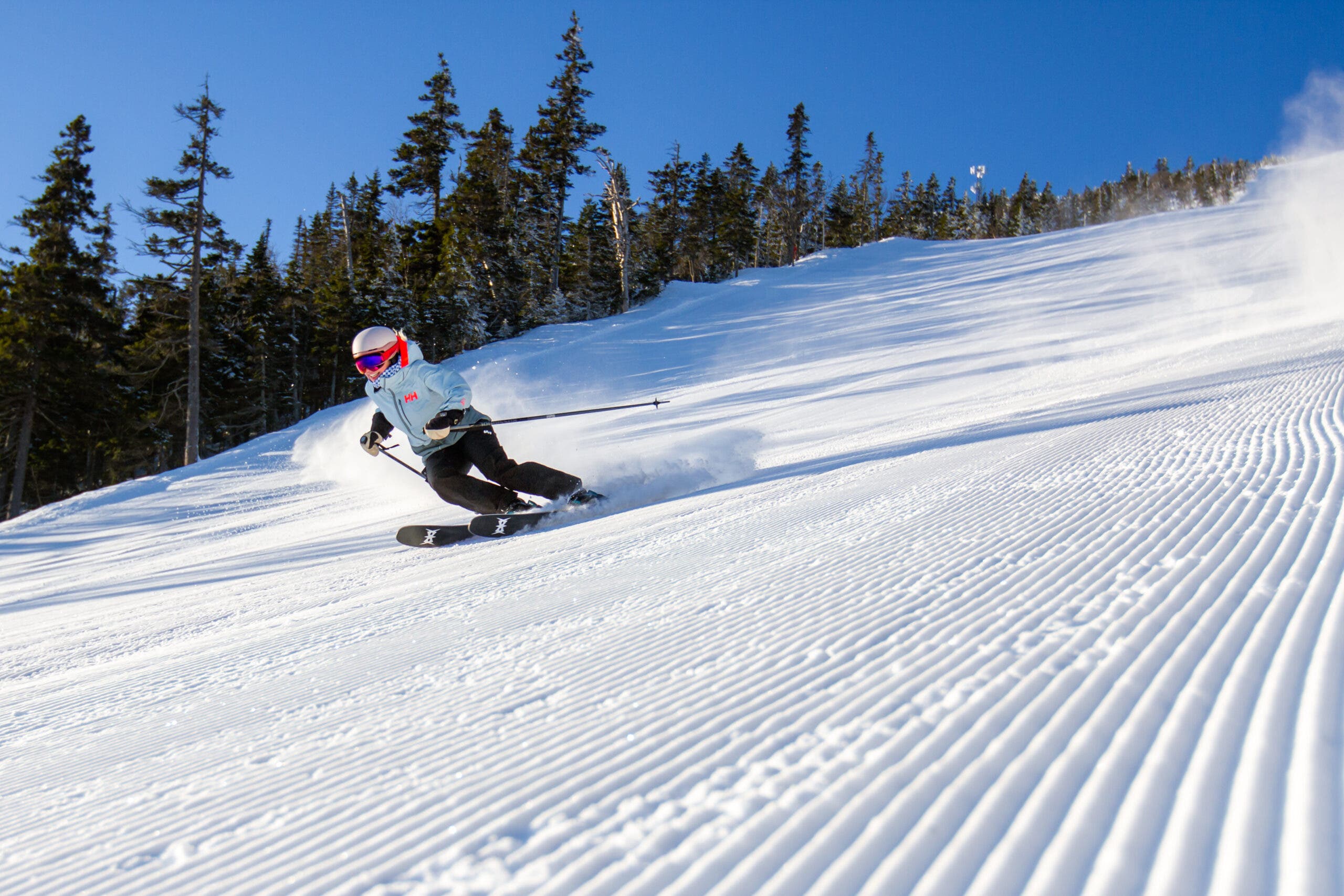 Skier goes down corduroy at Sugarloaf