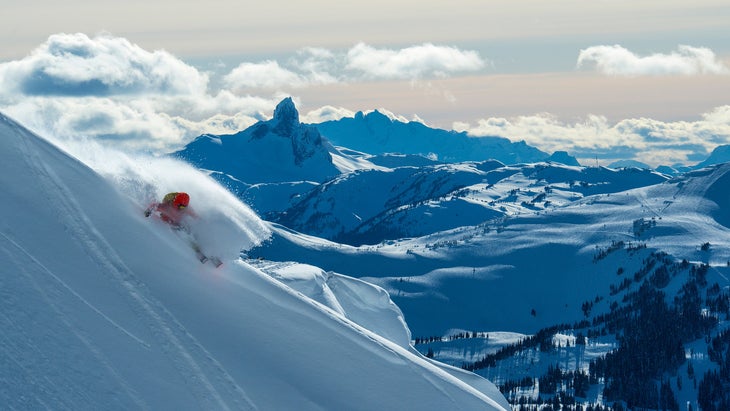Skier on Blackcomb Mountain with Black Tusk in Frame