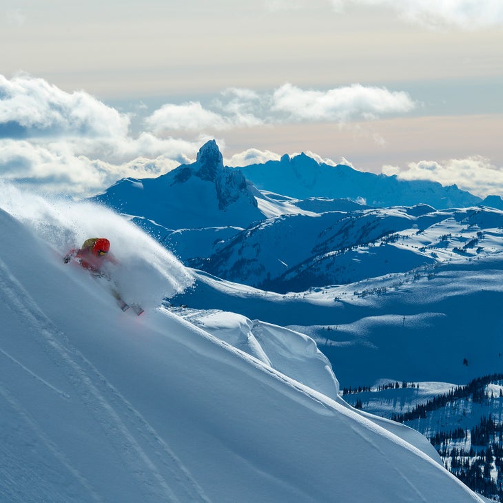 Skier on Blackcomb Mountain with Black Tusk in Frame