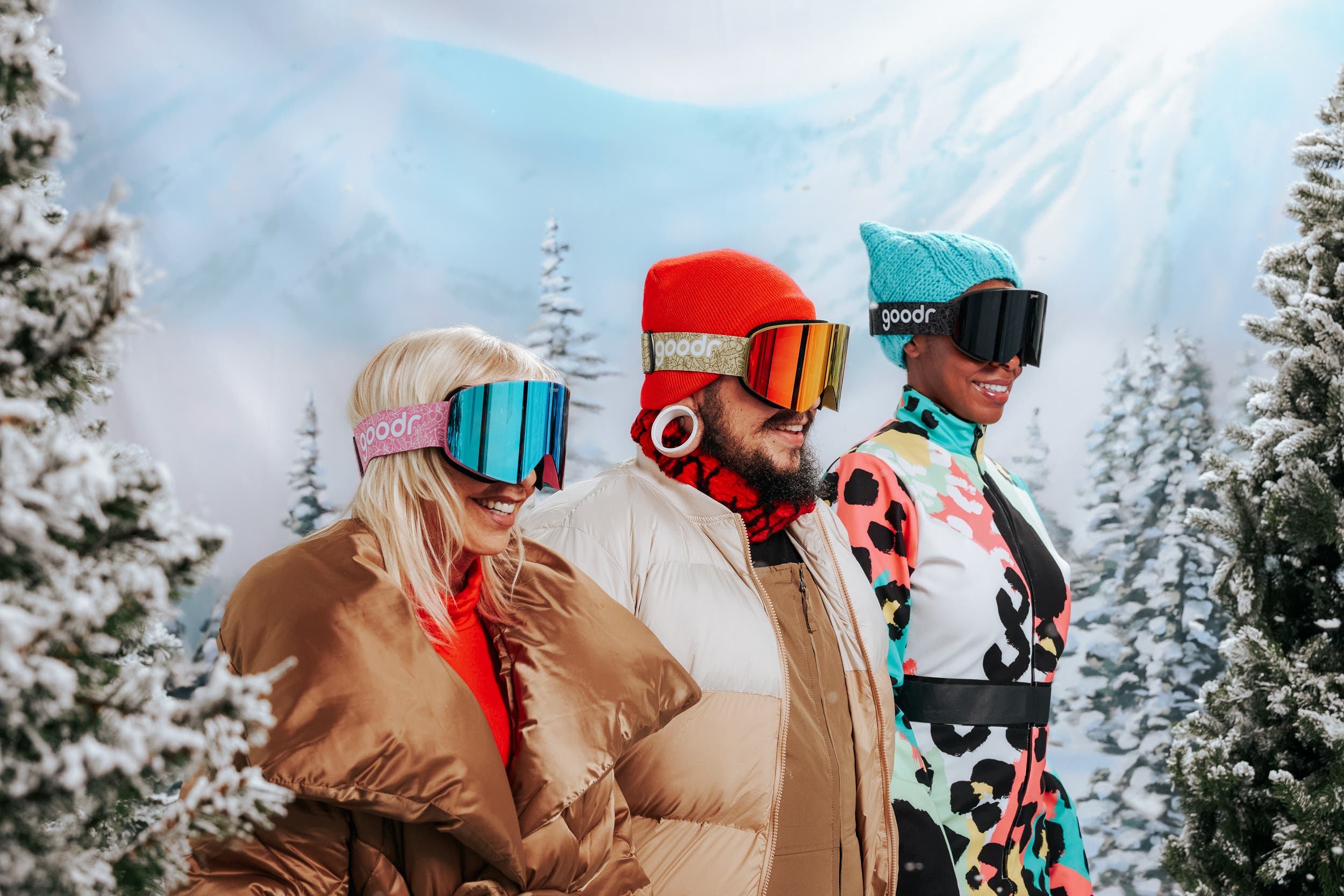 three skiers in goodr Snow-G snow goggles