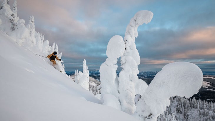 A skier skiing through the snow ghosts at Sun Peaks Resort.