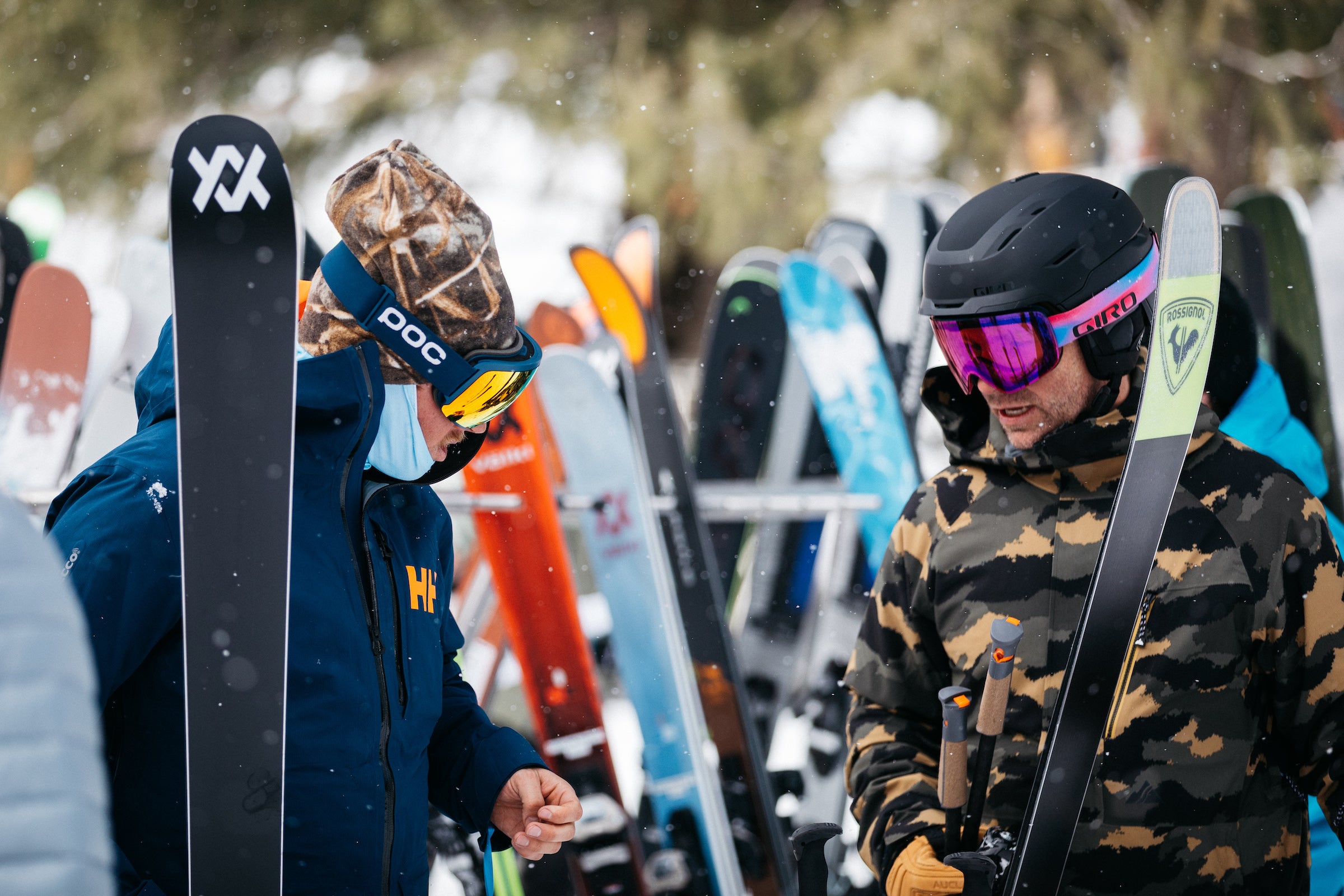 Ski testers at the 2024 Ski Test in Sun Valley selecting skis to test and exchanging test notes