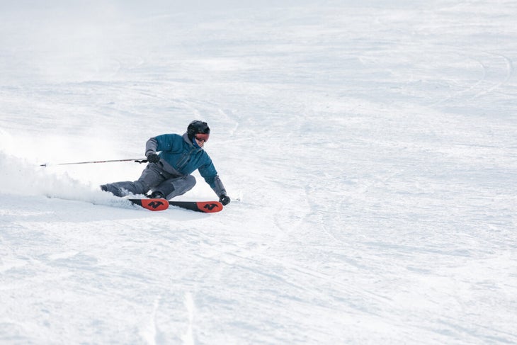Skier carves on the Nordica Enforcer 100