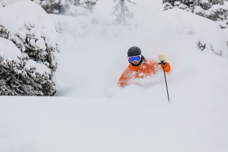 Skier in powder at ski test in Sun Valley
