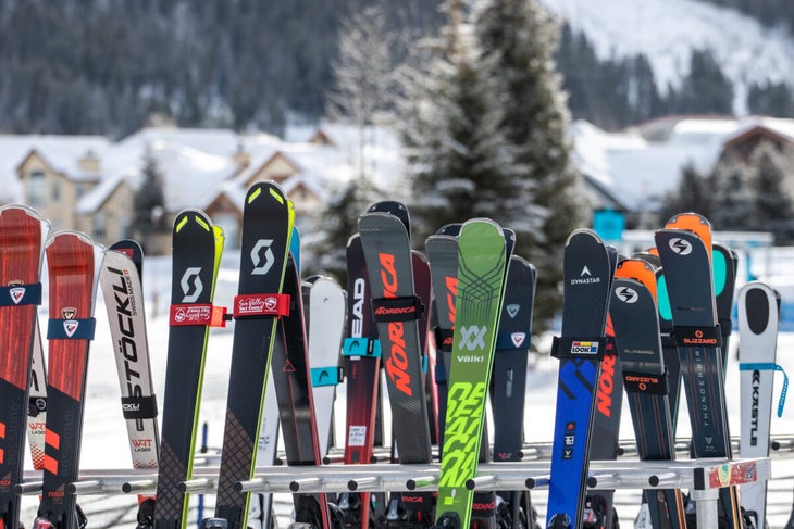 2024 carving skis lined up on rack at SKI Test at Copper Mountain