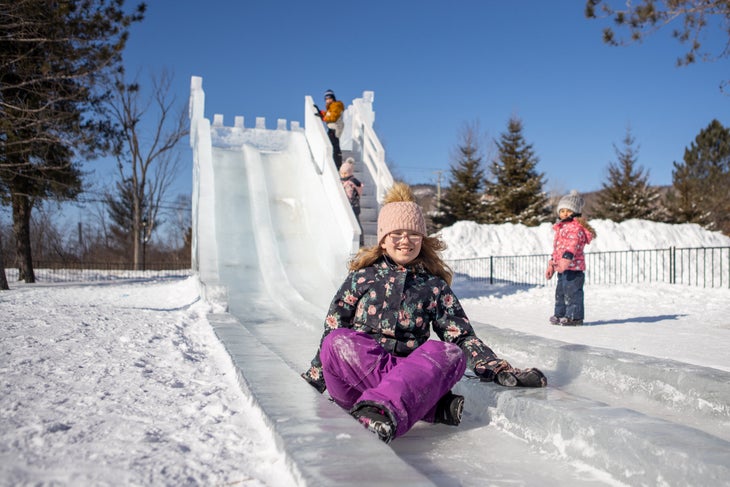 Child on an ice slide at Tremblant