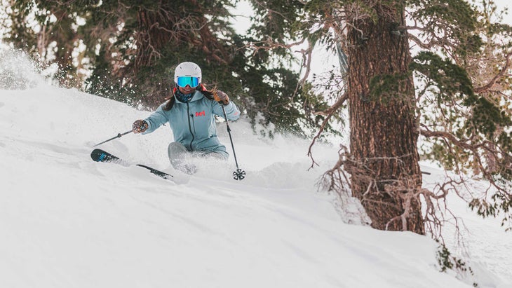 faqs woman skiing on powder