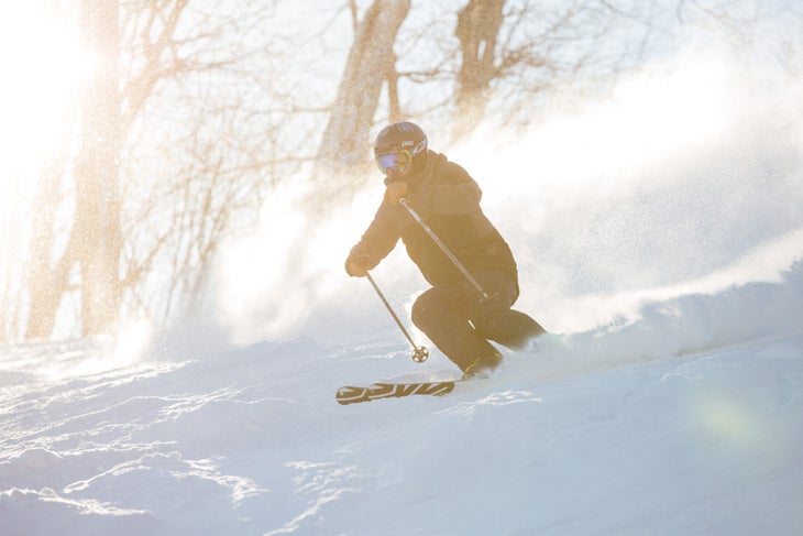 Soft light as skier goes downhill.