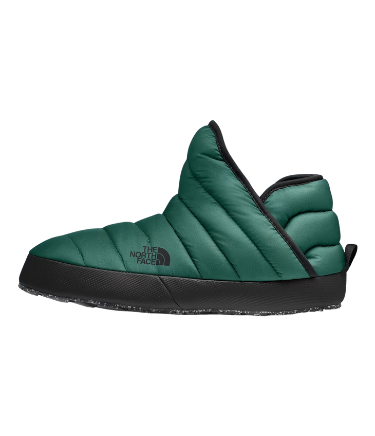 Emerald green ankle boots with The North Face logo.