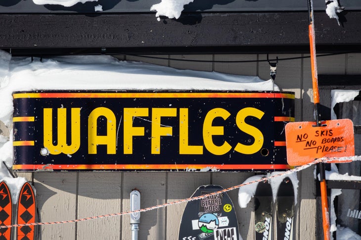 Black and yellow "waffles" sign