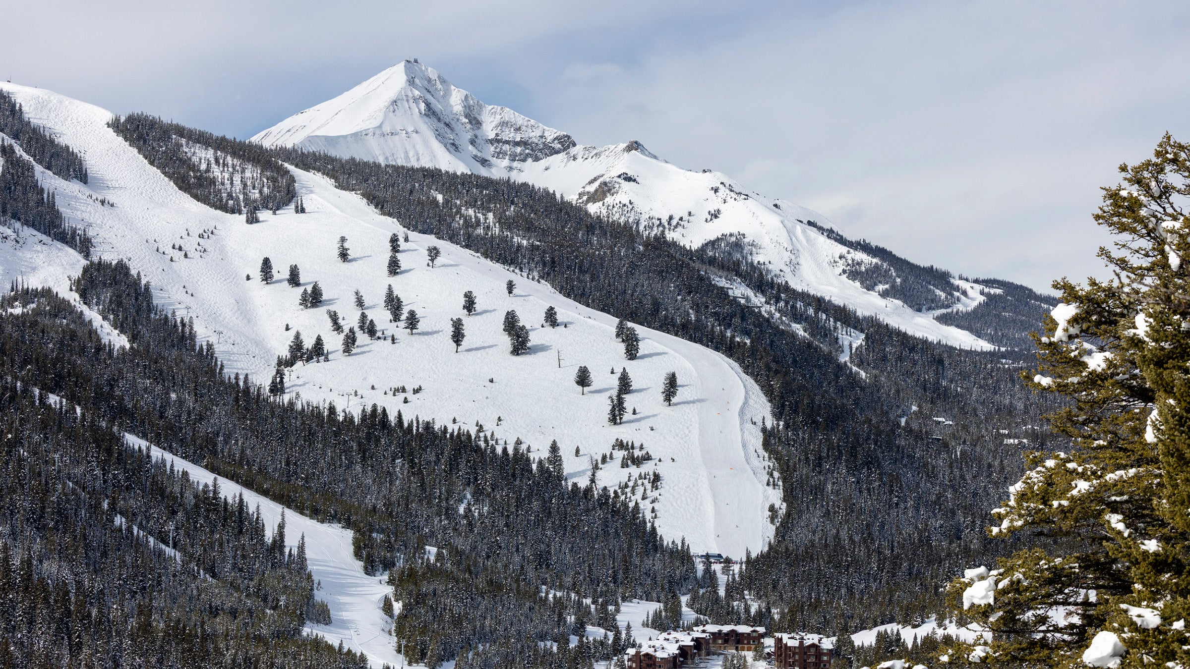 Shot of Lone Peak at Big Sky, Montana with ski runs below
