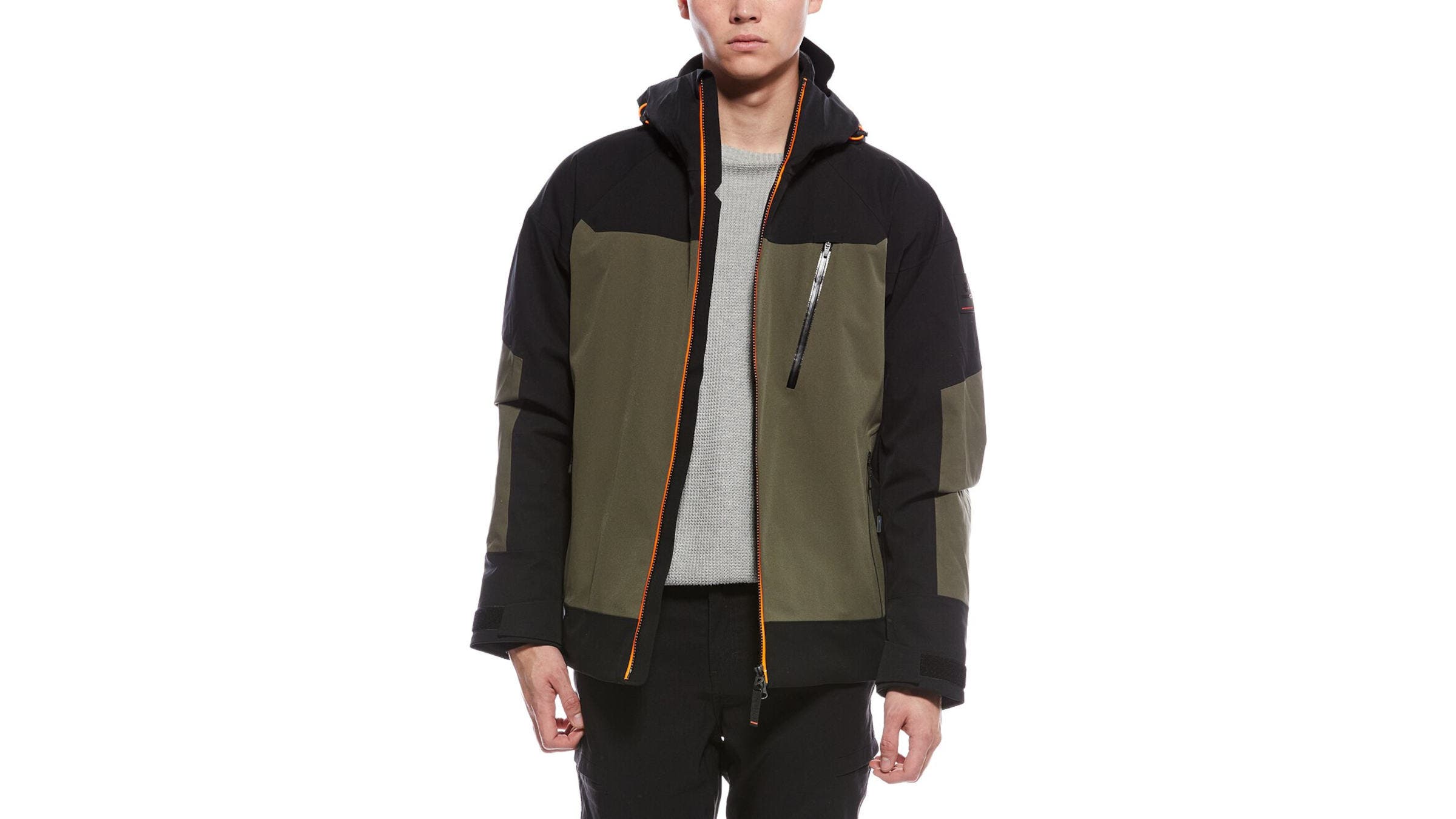 A man wearing a tan and black Bogner TAJO-T Jacket in front of a white background.